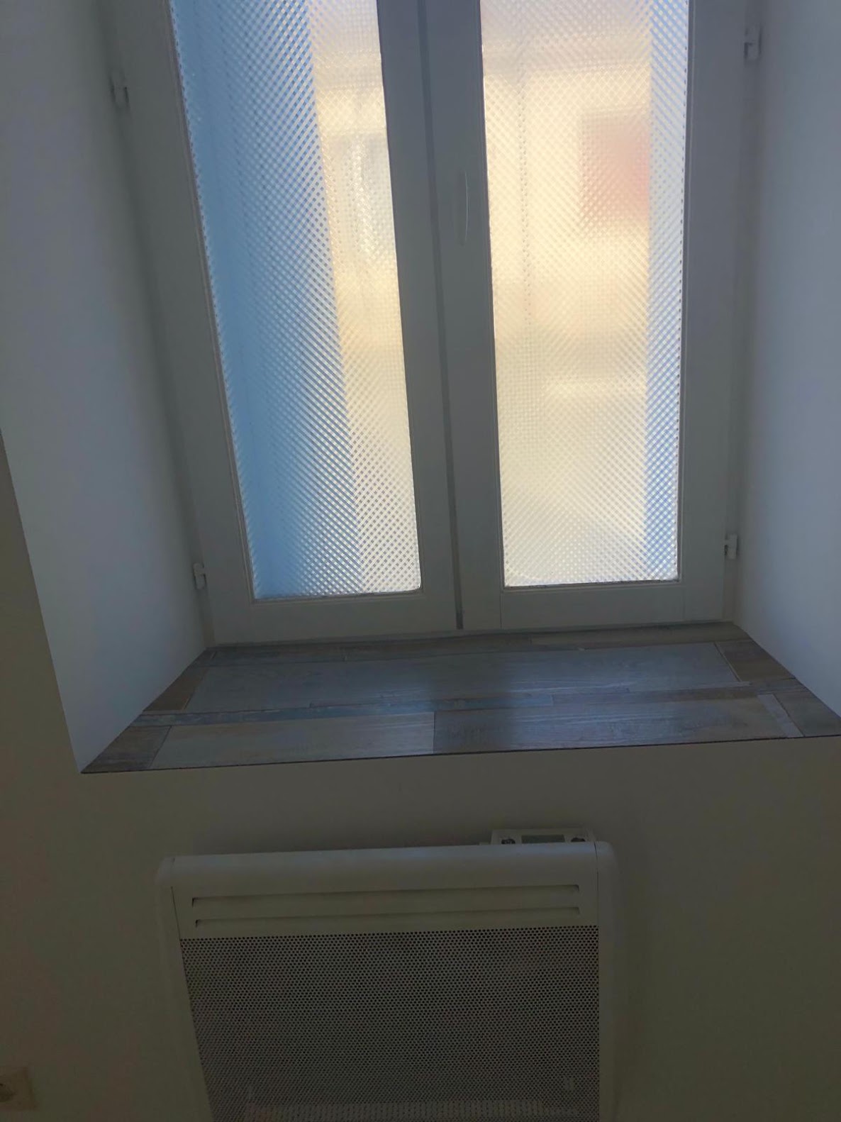 Réfection d'un appui de fenêtre carrelé
